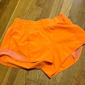 Orange Lululemon shorts